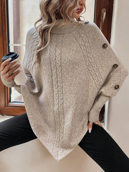 Alessia | Maglione a Poncho in Maglia a Trecce con Collo Alto e Maniche a Pipistrello