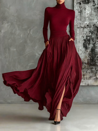 Rachele | Completo nero con gonna plissettata e maglia a maniche lunghe