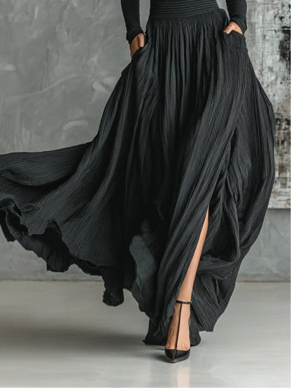 Rachele | Completo nero con gonna plissettata e maglia a maniche lunghe