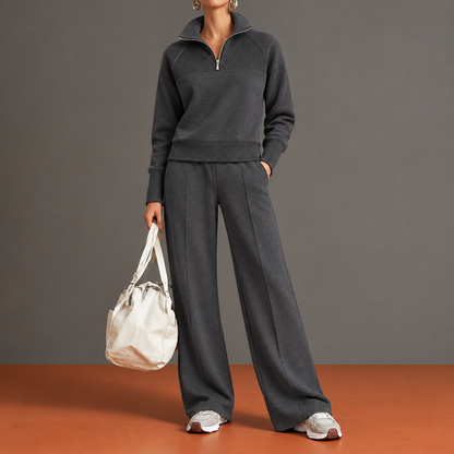 Carlina: completo grigio antracite con mezza zip, sprone a coste e maniche raglan.